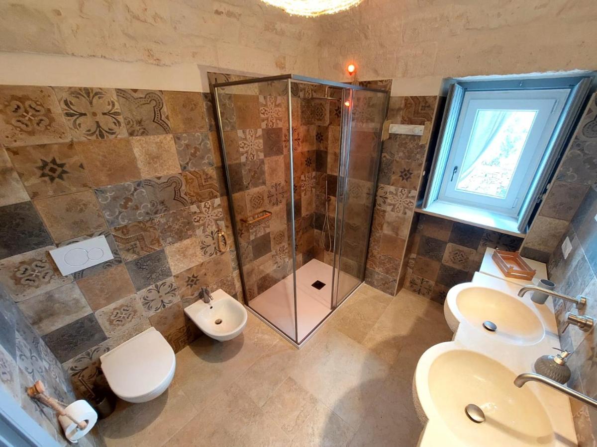 Trulli Carlo Anna Villa โลโกโรตอนโด ภายนอก รูปภาพ