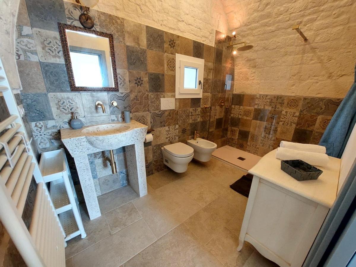 Trulli Carlo Anna Villa โลโกโรตอนโด ภายนอก รูปภาพ